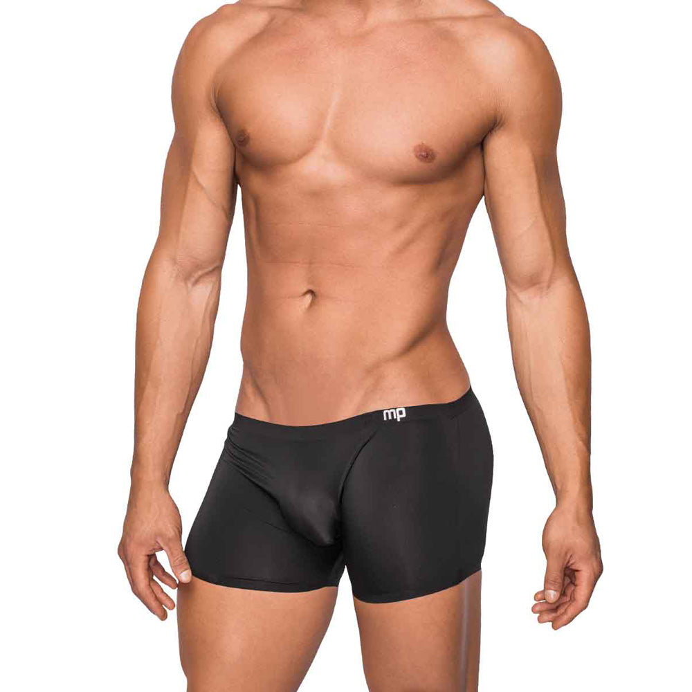 Male Power Seamless Sleek Short With Sheer Pouch Black modeled by a fit man wearing sleek black shorts.