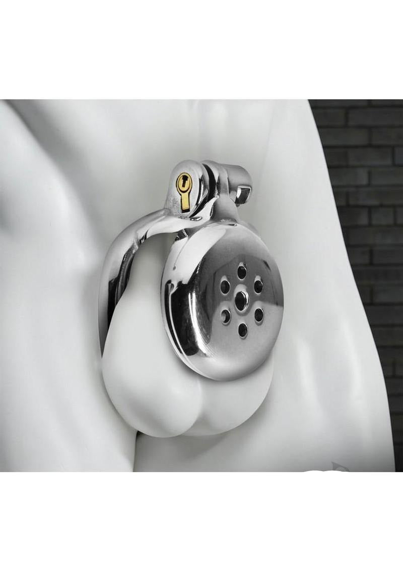 Master Series Inverted Chastity Cage Silver shown on a mannequin, showcasing its sleek design and secure fit.