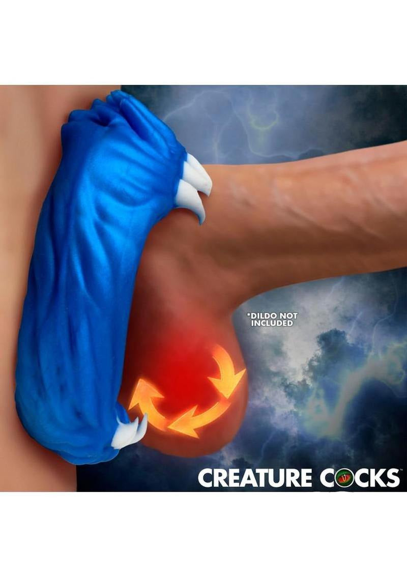 Creature Cocks Venom Loop Silicone Cock Ring Blue on a male appendage, featuring fangs and a textured design.