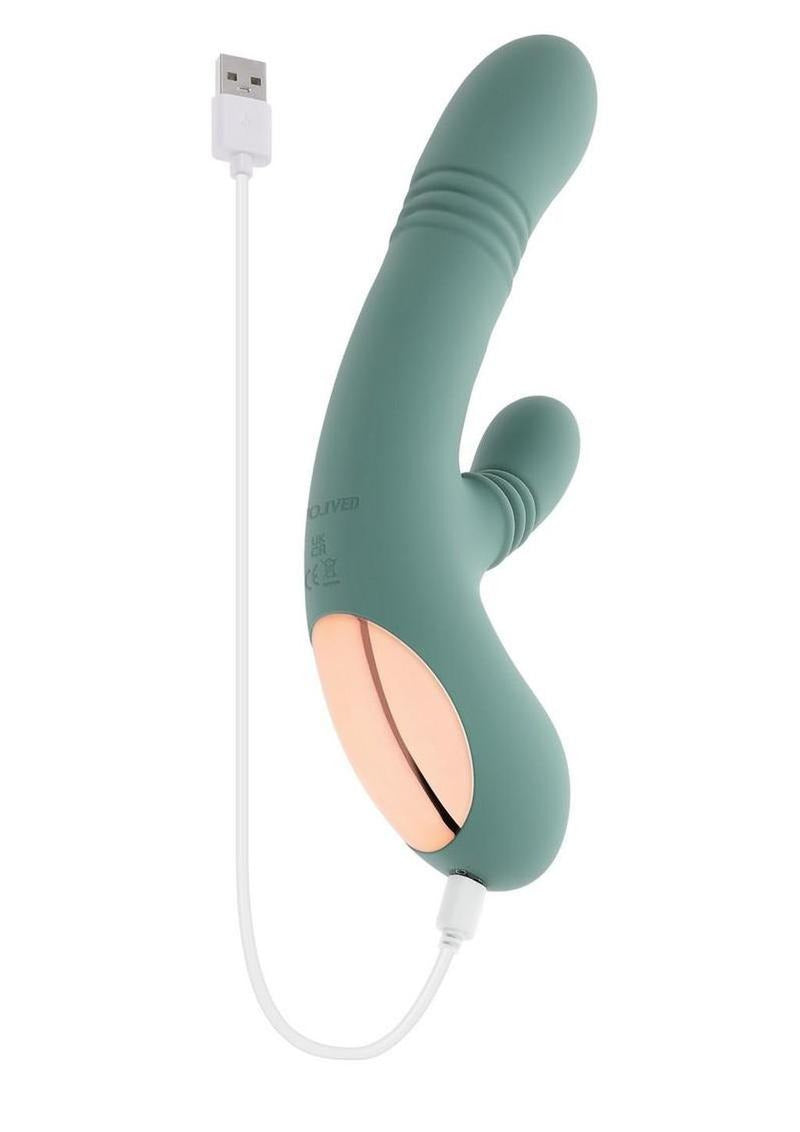 Rub Me Tender Thrusting Vibrator with Clitoral Stimulation Green on white background with charging cable.