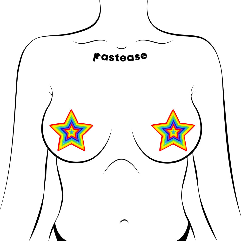 Pastease Glitter Pumping Star Pasties Rainbow on a figure, showcasing colorful star-shaped pasties.