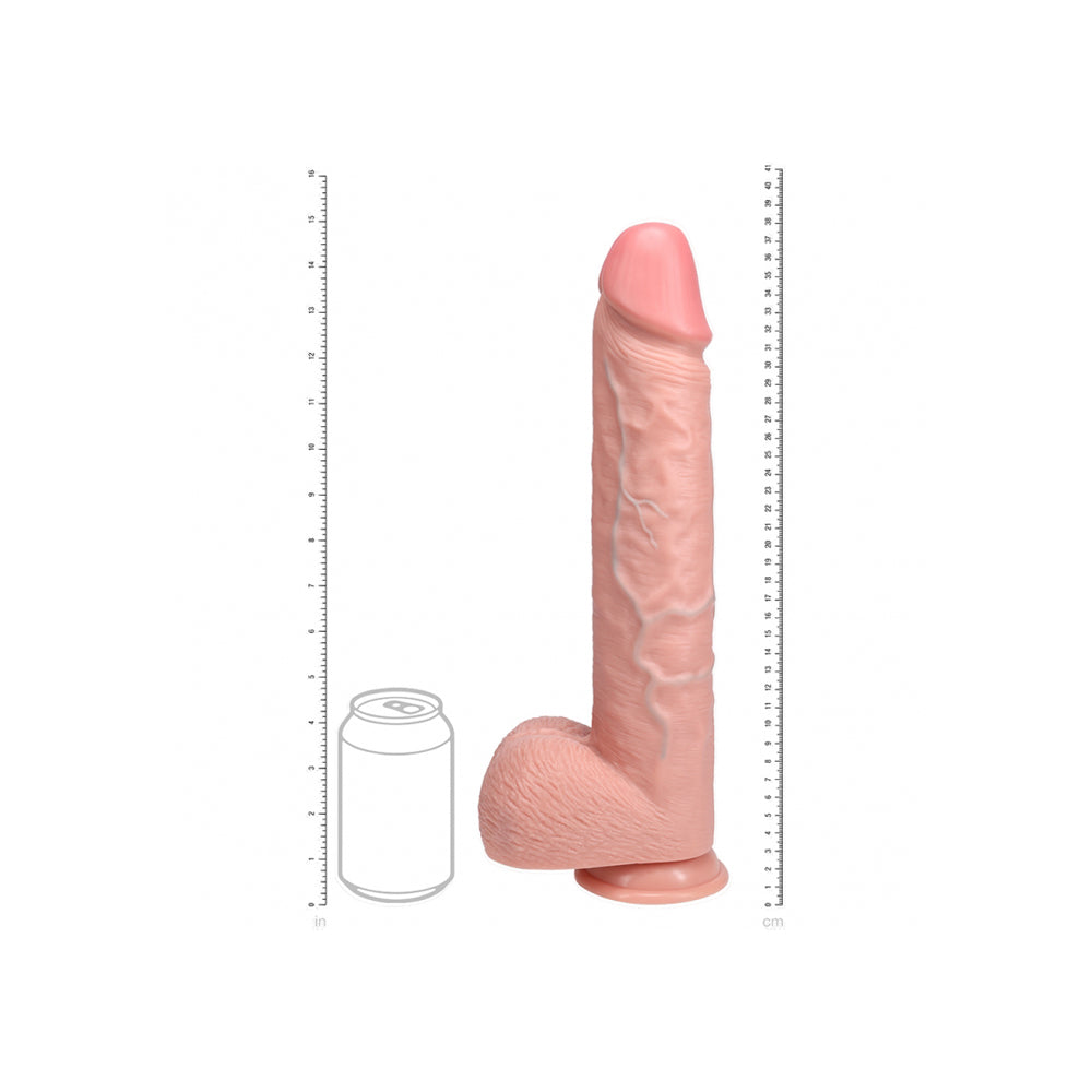 Realrock Extra Long Realistic Dildo With Balls 15 inches Flesh next to a can for size reference.