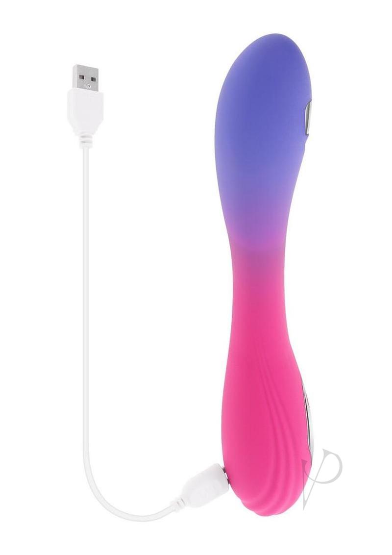 Evolved Paradise Pulse Silicone Butterfly Vibrator in violet and pink with USB charging cable attached.