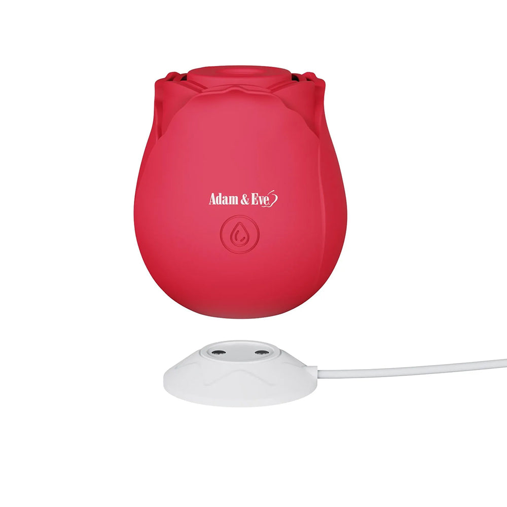 Adam & Eve Eve's Ravishing Suction Rose Clitoral Stimulator in rose design with charging dock.