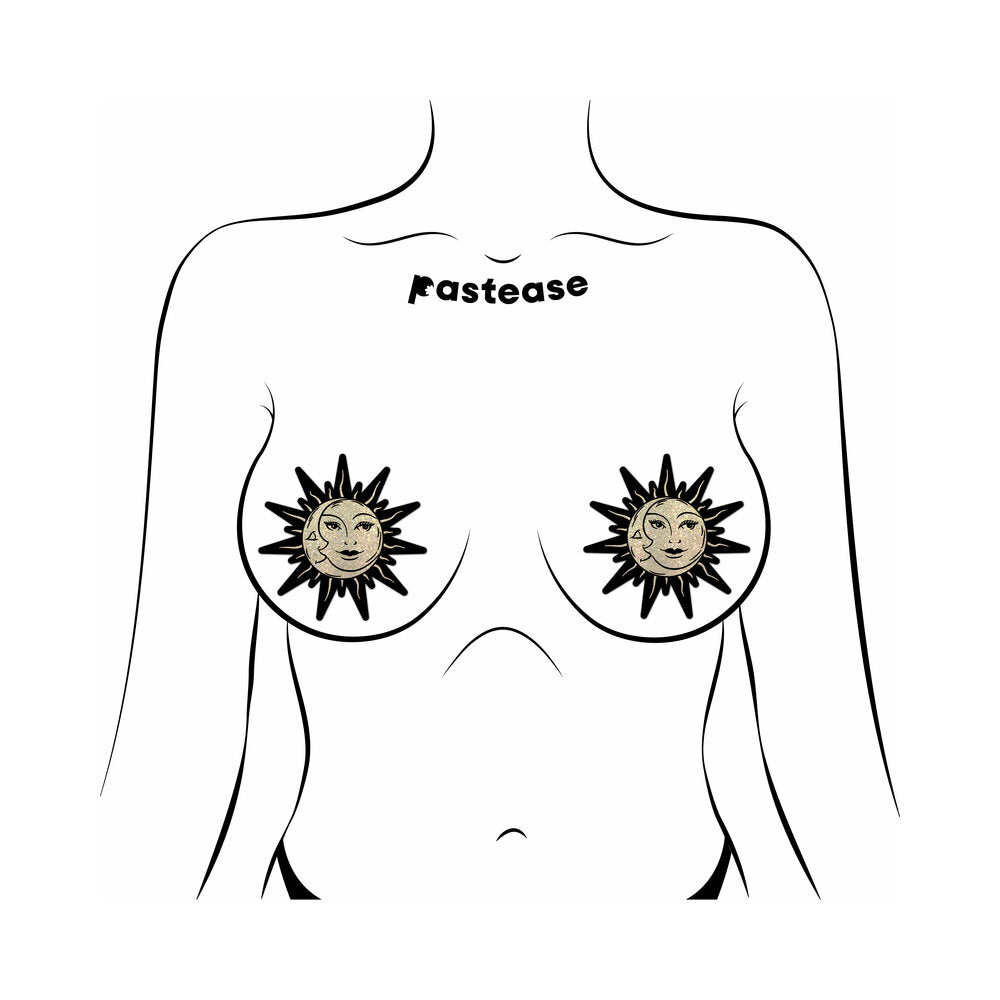 Pastease Sunburst Sun & Moon Faces Gold Glitter Pasties on a figure, showcasing celestial sun and moon designs.