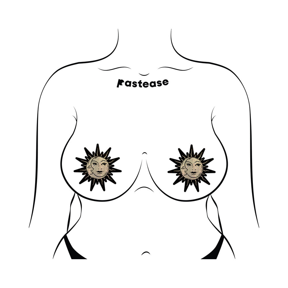 Pastease Sunburst Sun & Moon Faces Gold Glitter Pasties displayed on a model with sun and moon designs.