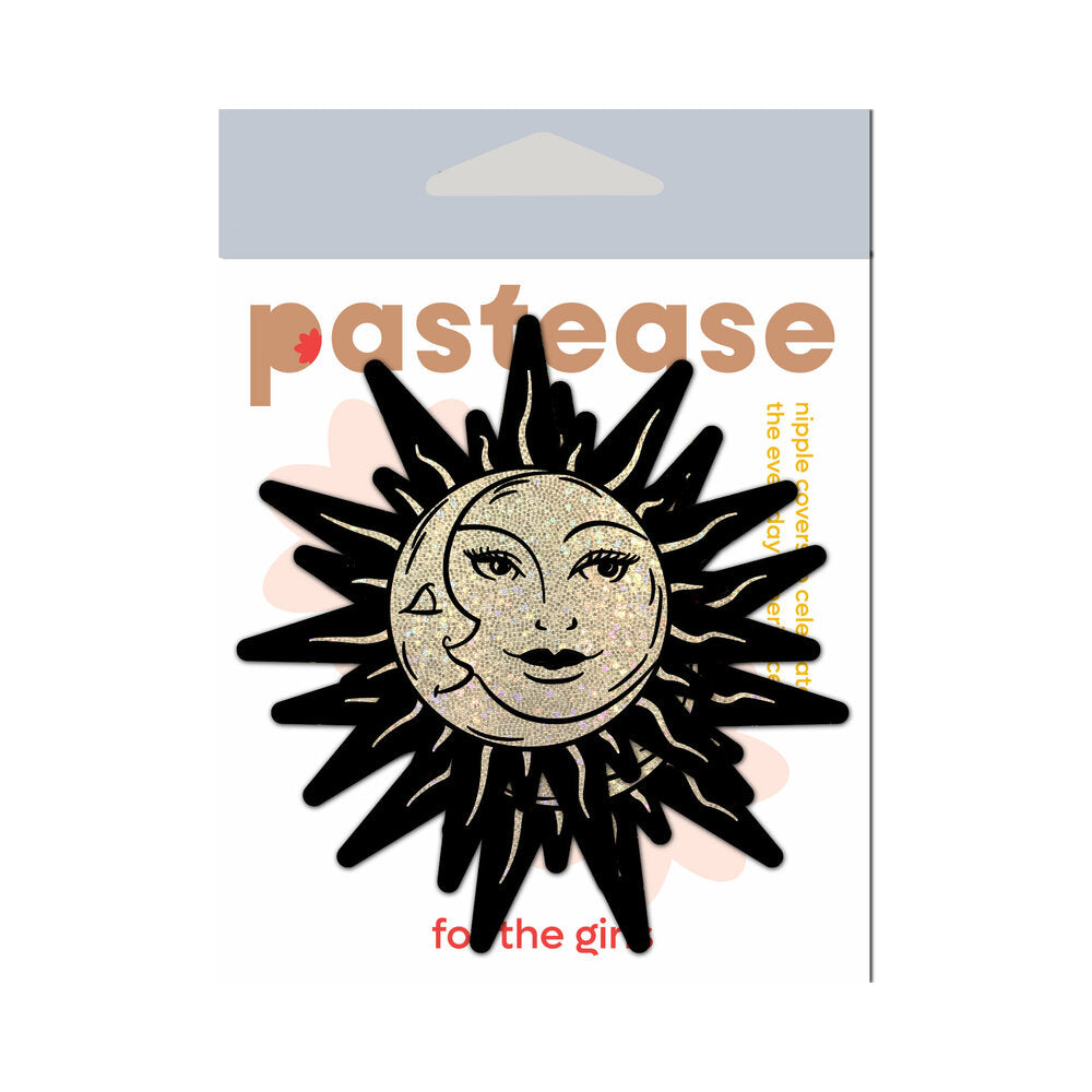 Pastease Sunburst Sun & Moon Faces Gold Glitter Pasties on packaging featuring sun and moon design.