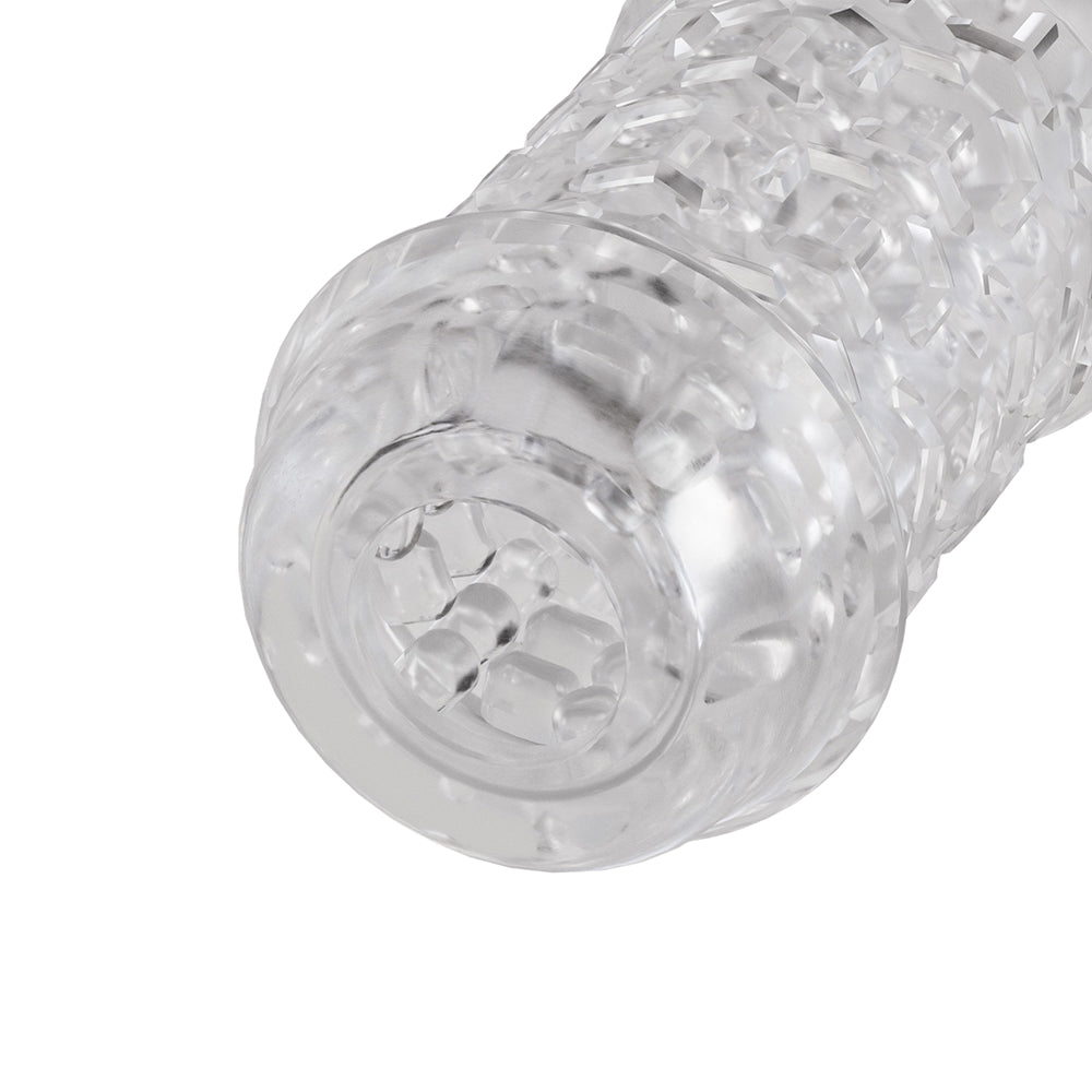 The Handy TrueGrip Gen 2 Masturbator Sleeve Clear showcasing its textured design and extended length.