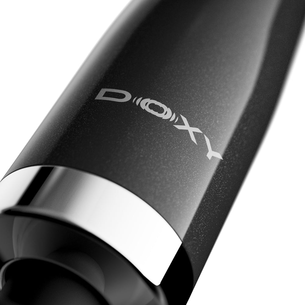 Close-up of the Doxy Die Cast Max Plug-in Wand Massager Black showcasing its sleek design and Doxy branding.