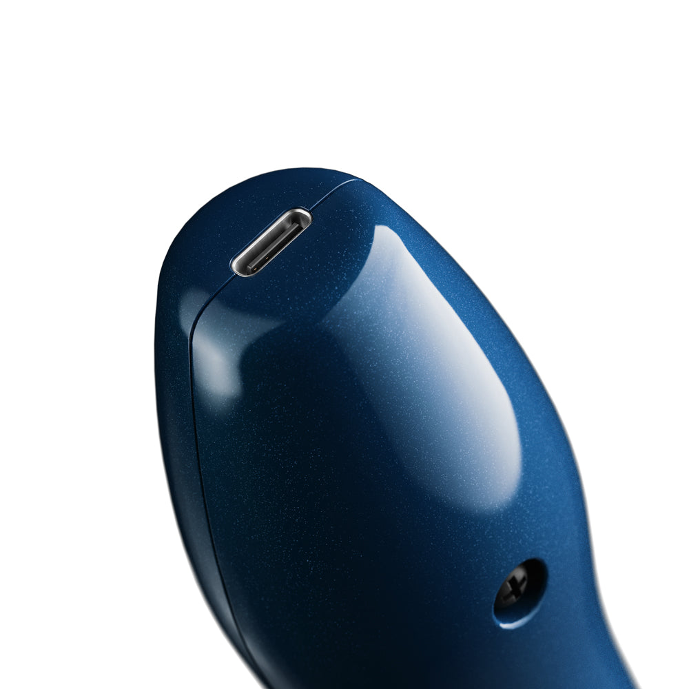Close-up of the Doxy Die Cast Compact Cordless Wand Massager Blue showcasing its sleek design and charging port.