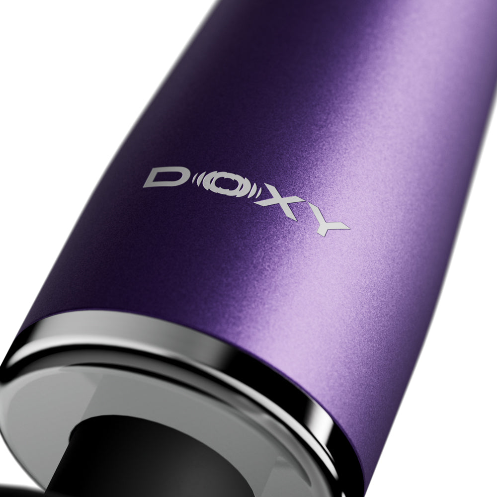 Close-up of the Doxy Go Travel-sized Wand Massager Purple showcasing its sleek design and branding.