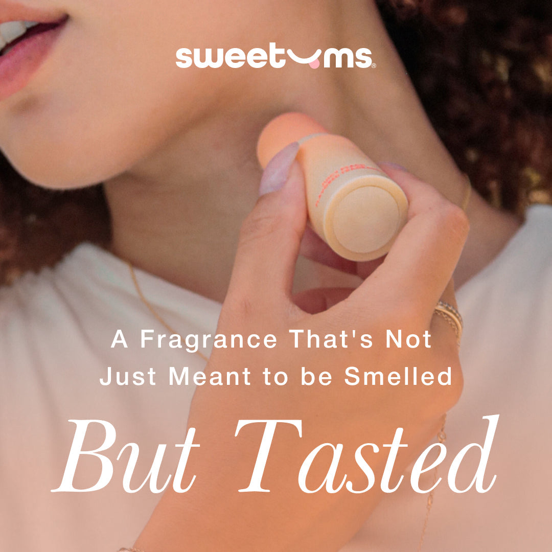 Sweetums Sweet Spot Fragrance Pineapple Coconut Crush solid fragrance stick in use, highlighting its edible qualities.