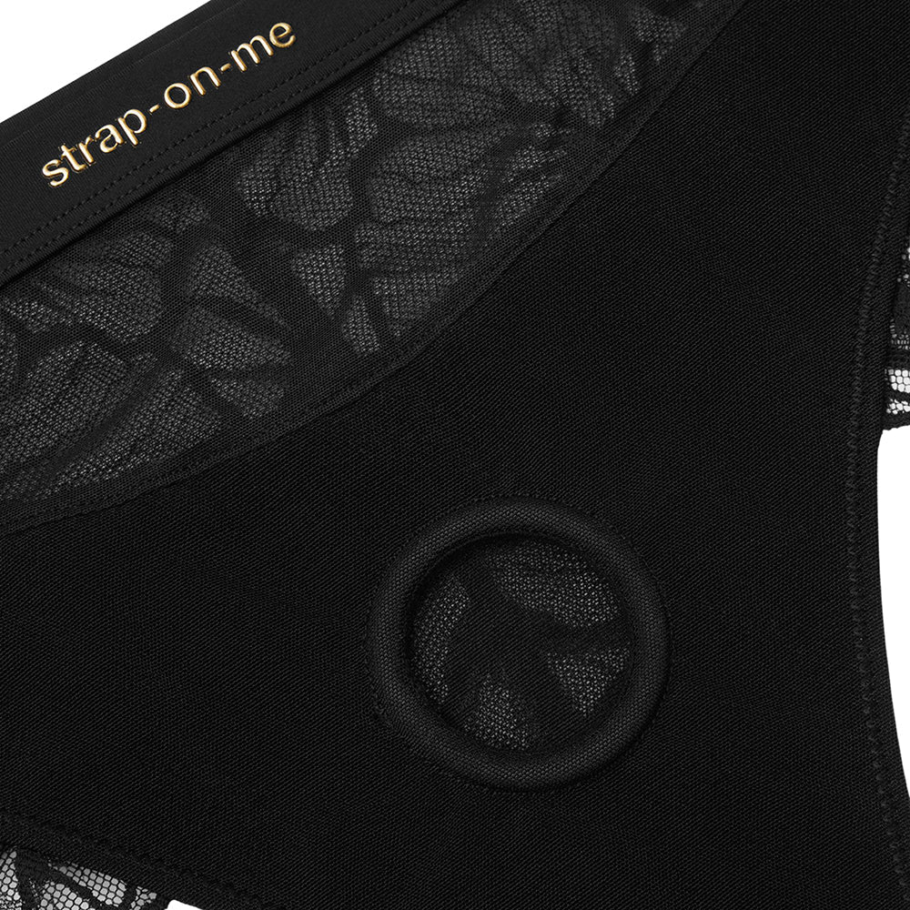 Strap-on-me Harness Lingerie Sublime M Black showcasing the high-waisted thong design and lace detailing.