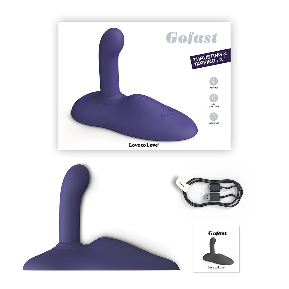 Love To Love Gofast Thrusting Vibrator Midnight Indigo with packaging and charging cable.