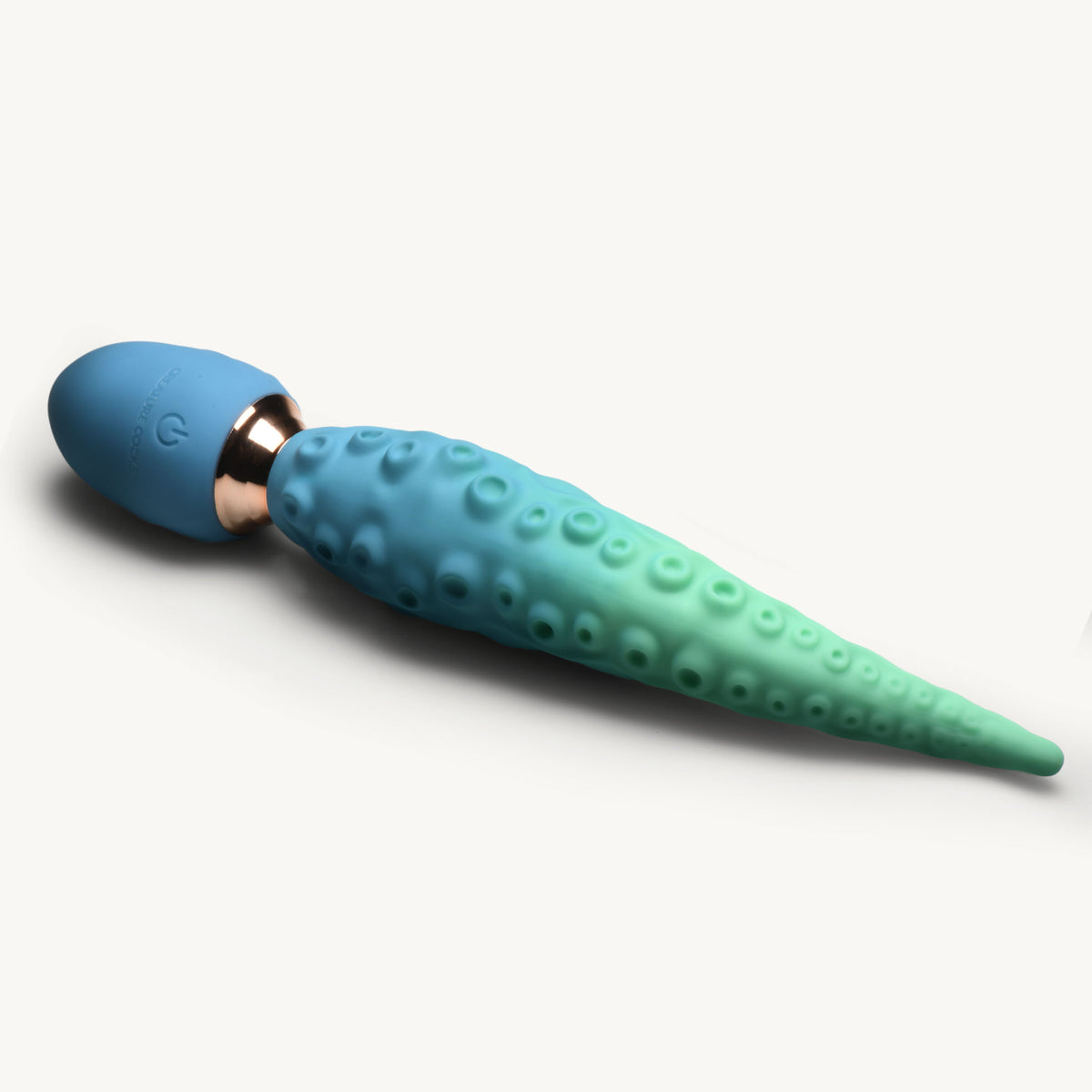 Creature Cocks Deep Squirmer Squirming Silicone Vibrator in blue and green, featuring a tentacle design for stimulation.