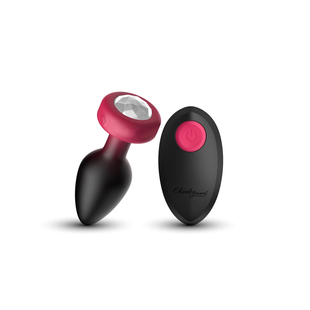 Cheeky Charms Eluxe Vibrating Anal Plug Ruby and remote control on a white background.
