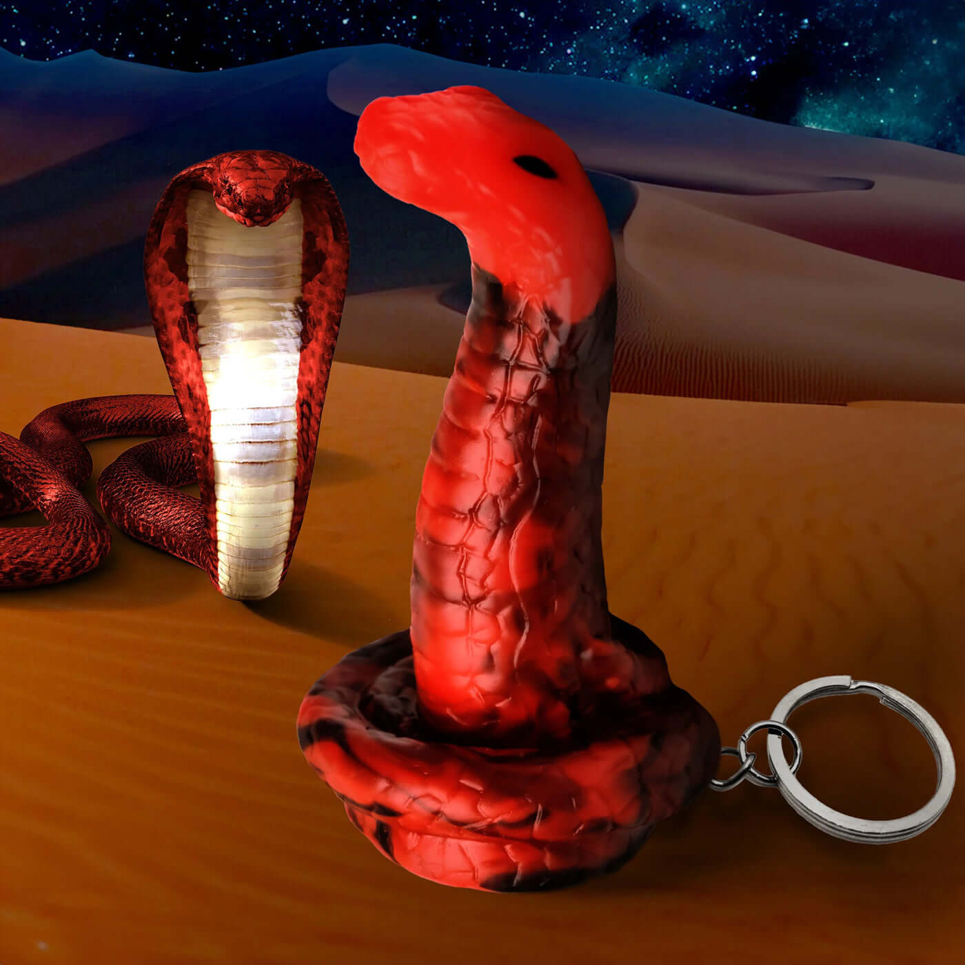 Red King Cobra keychain on desert backdrop, perfect for fantasy roleplay and mythical creature enthusiasts, adds flair to keys or bags.