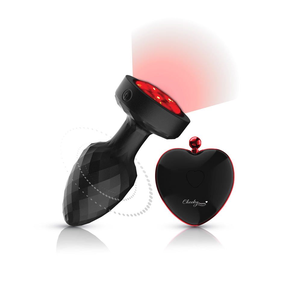 Twila Twirling Light Up Vibrating Plug With Heart Remote featuring a glossy design and illuminated remote.