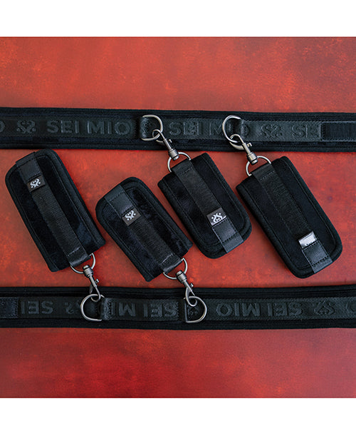 Sei Mio Pretty Thighed Up Thigh Wrist & Ankle Restraint set featuring elegant black straps and adjustable clips.
