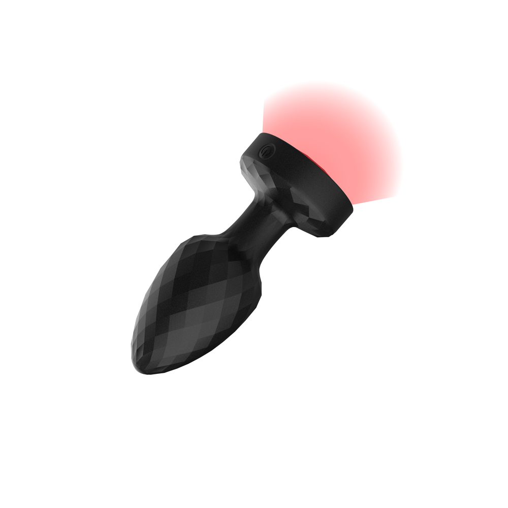 Twila Twirling Light Up Vibrating Plug With Heart Remote in black with glowing red light on top.
