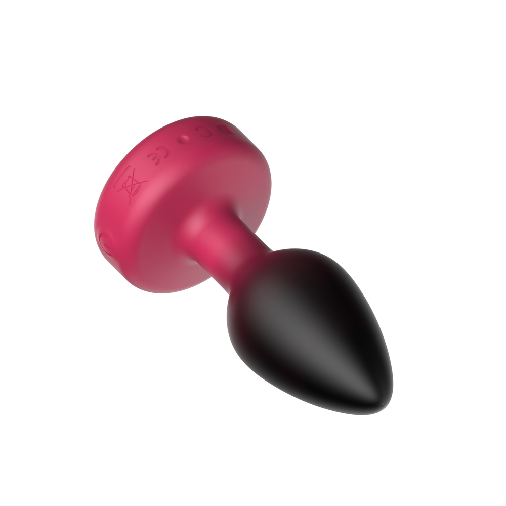 Cheeky Charms Eluxe Vibrating Anal Plug Ruby in sleek design with jeweled base and silicone texture.