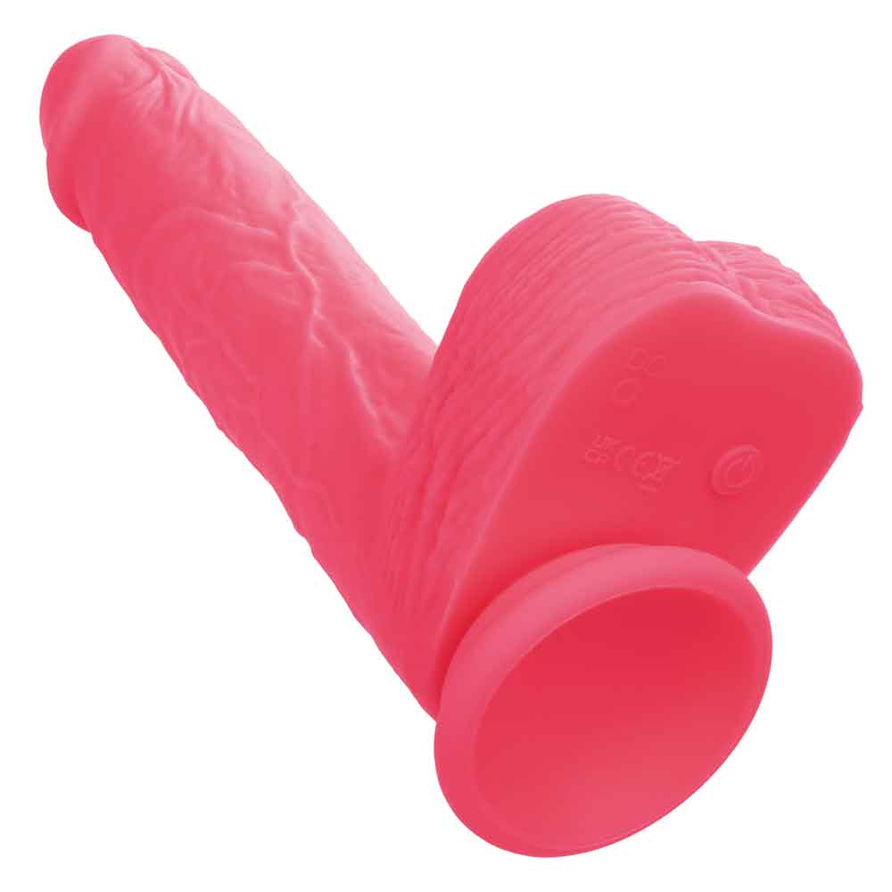 Rechargeable pink silicone stud with thrusting and rumbling features, 7 inches, lifelike texture.