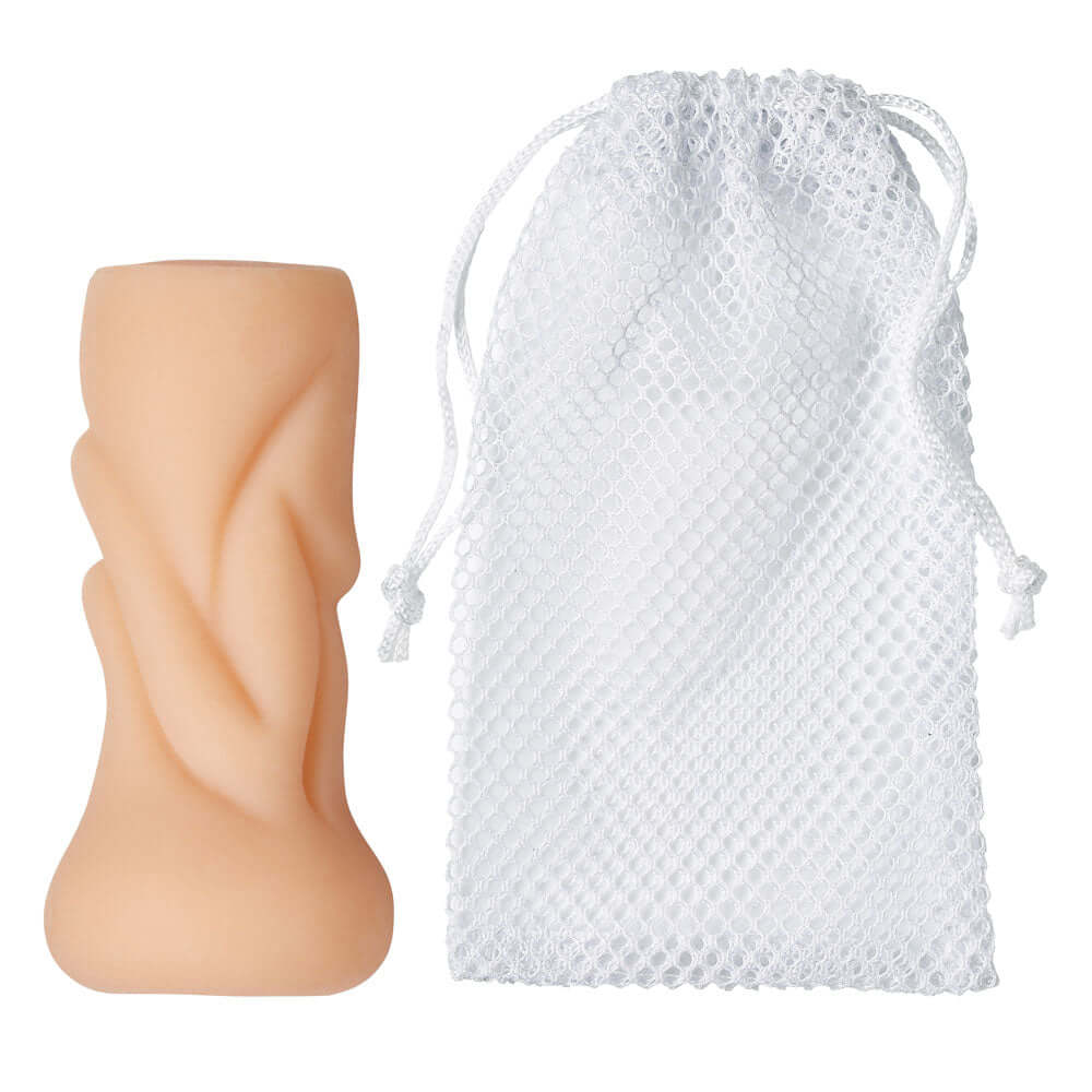 Anal Pocket Stroker Stroker Flesh next to a white mesh storage bag, highlighting its compact design and portability.