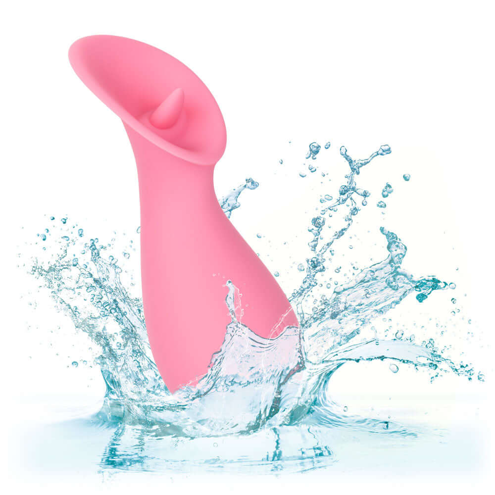 Slay Tickle Me Clitoral Massager in pink splashing through water for powerful stimulation and precise control.