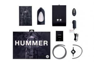 Vedo Hummer Super Bj Machine Black components including the device, remote, and packaging.