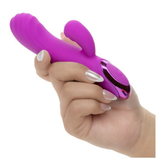 Kroma Turbo Passion Vibrator Purple held in hand showcasing its ergonomic design and dual stimulation features.