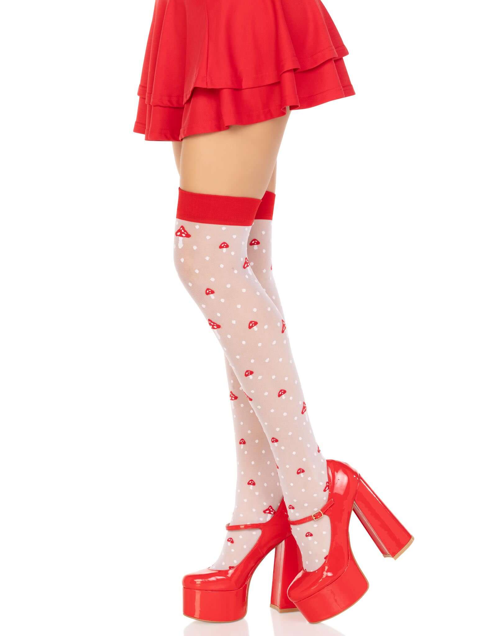 White sheer polka dot mushroom thigh high stockings with red trim, paired with red high heels and a red skirt.