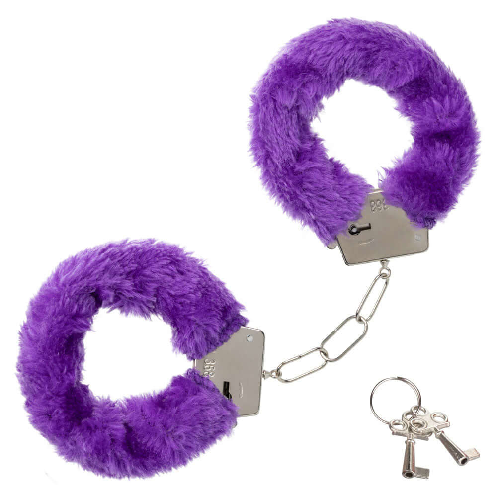 Pleasure Kits Indulgent Collection Purple fuzzy handcuffs with silver chain and keys for intimate moments.