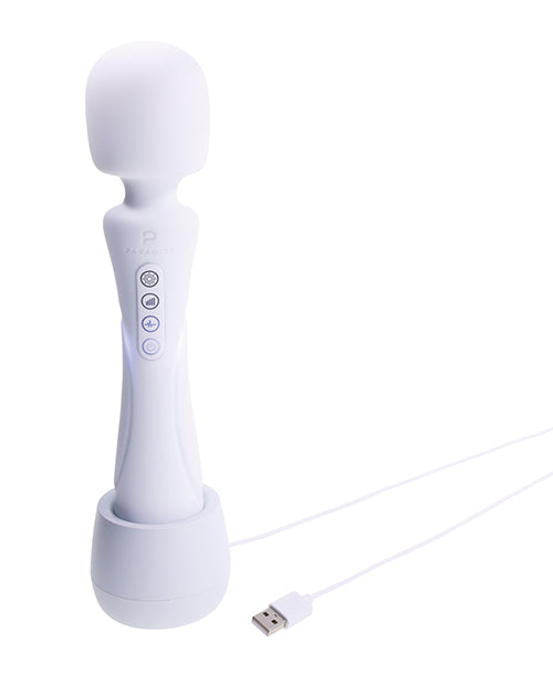 Illumination THE Wand Massager White charging on a base, featuring LED buttons for adjustable settings.