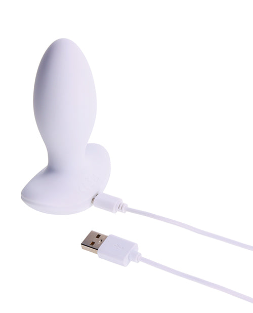 Illumination THE Plug Vibrator White with USB connection for charging and customizable LED features.
