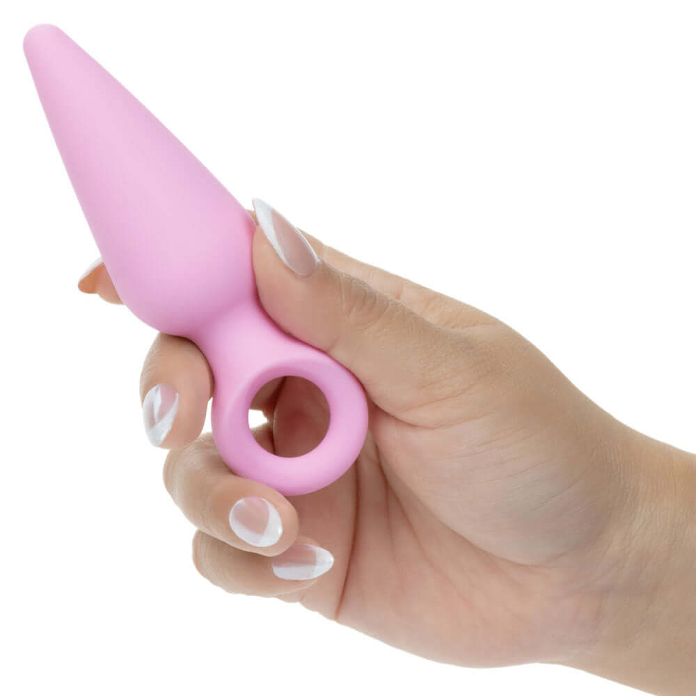 First Time Booty Probe Duo Pink held in a hand, showcasing its beginner-friendly design for anal play.