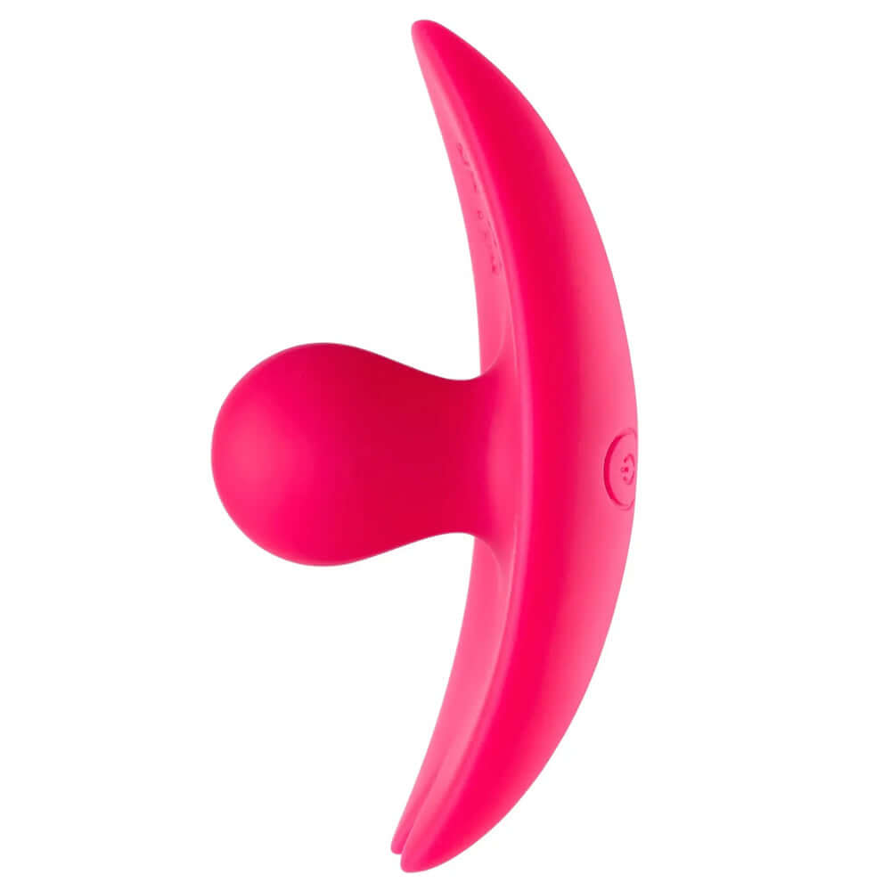 Camel Toe Shaped Vibrator With Remote Pink, a discreet and ergonomic silicone massager for hands-free enjoyment.