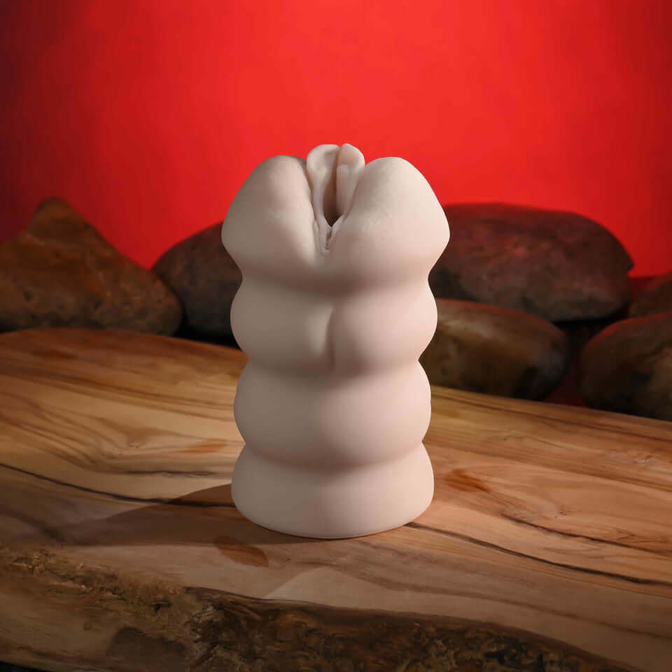 Riley Reid Movie With Mini Vagina Stroker displayed against a rustic background.