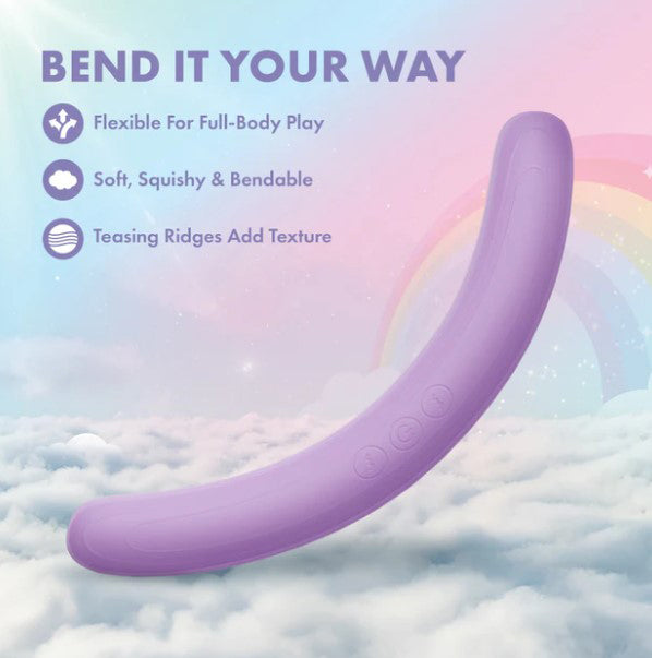 Play With Me Silicone Double Ended Vibrator Purple on soft clouds with a rainbow background showcasing its flexible design.