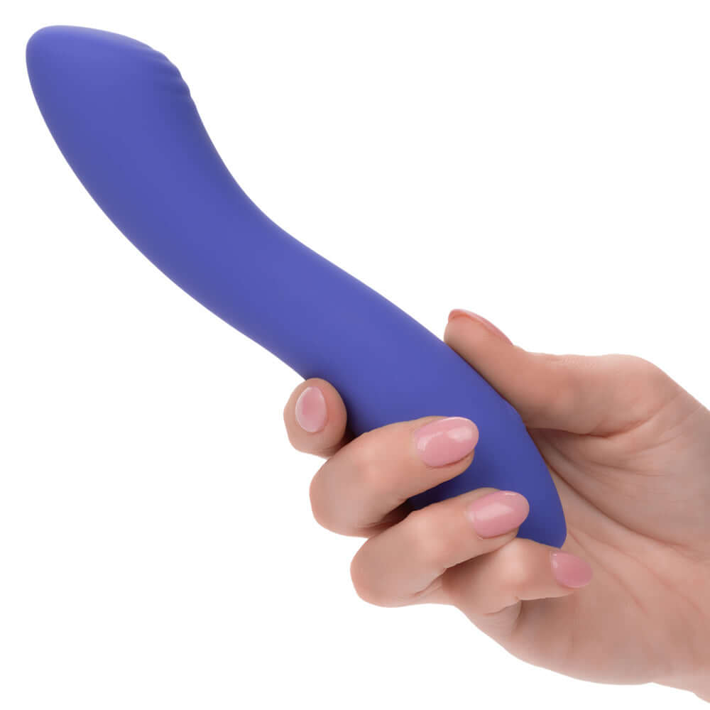Hand holding CalExotics Connect Contoured 'G' Massager in blue, showcasing its ergonomic design for enhanced intimate pleasure.