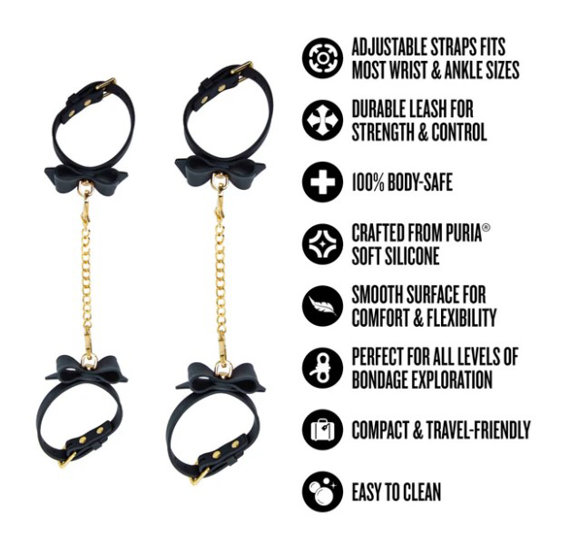 Temptasia Ardor Wrist & Ankle Restraints Black With Bow features adjustable straps, durable leash, and smooth silicone for comfort.