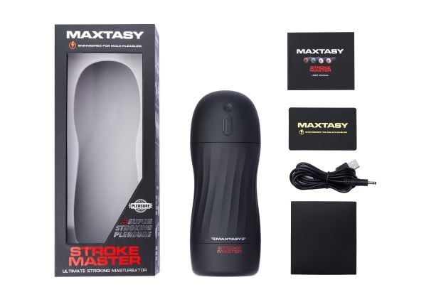 Maxtasy Stroke Master Automatic Male Stroker Nude device displayed in packaging with accessories.