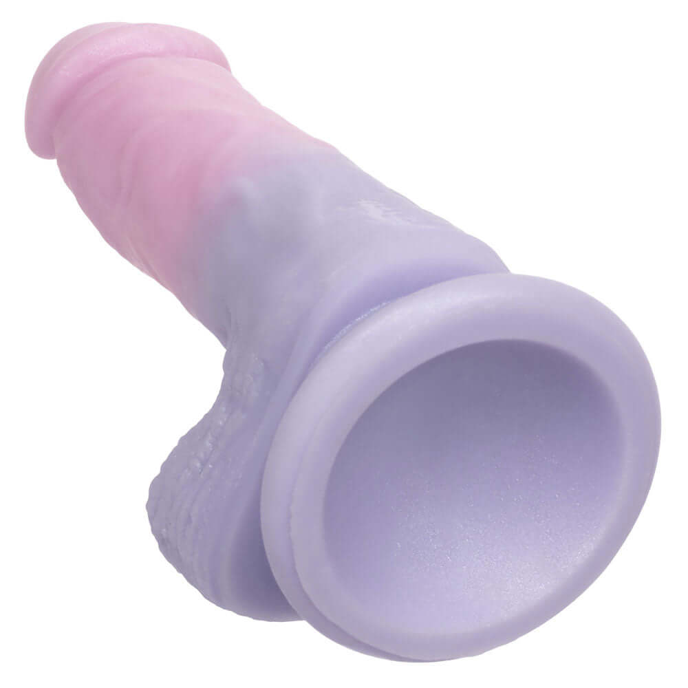 First Time Liquid Silicone Dong 4 inch in soft pink and purple silicone, designed for comfort and flexibility.