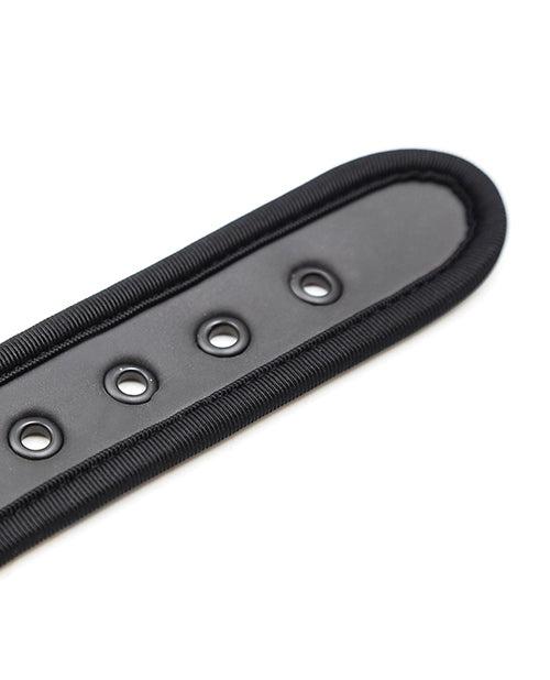 Plesur Neoprene Puppy Collar Black close-up showing the soft material and D-ring fittings.