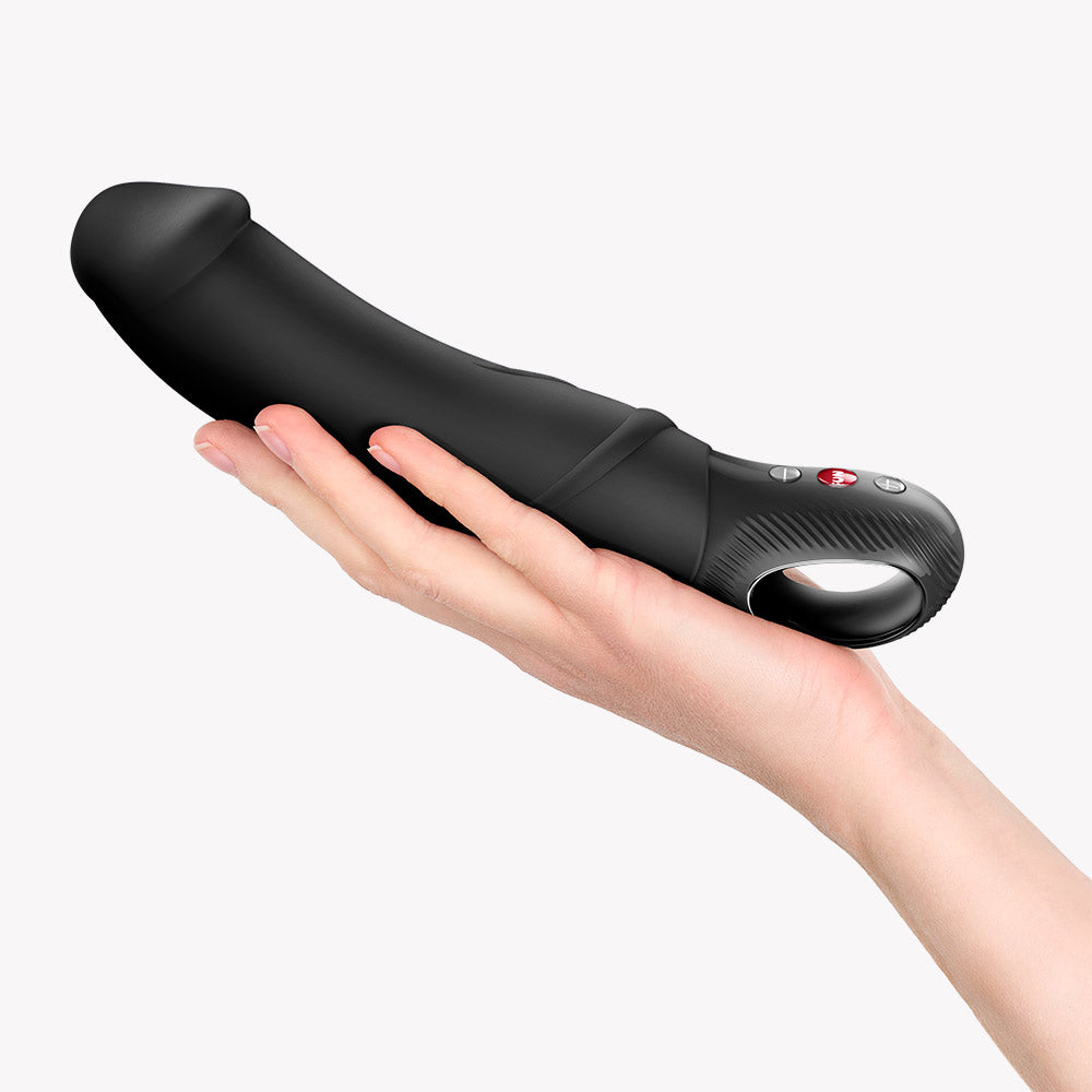Fun Factory Big Boss G-Spot Vibrator Black held in hand, showcasing its ergonomic design and controls.