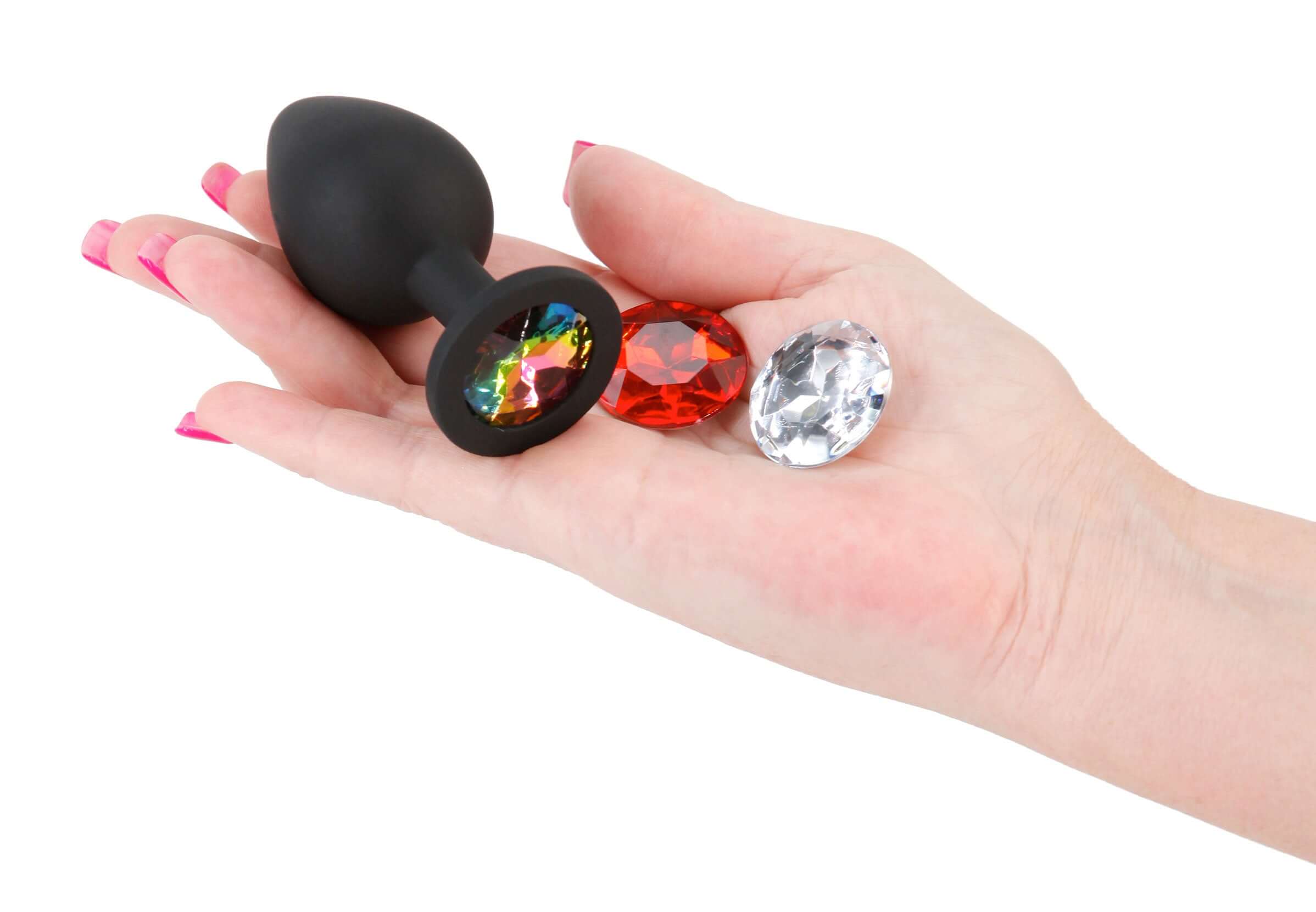 Glams Xchange Round Medium Butt Plug Black with colorful gem accents held in hand, showcasing its stylish design.