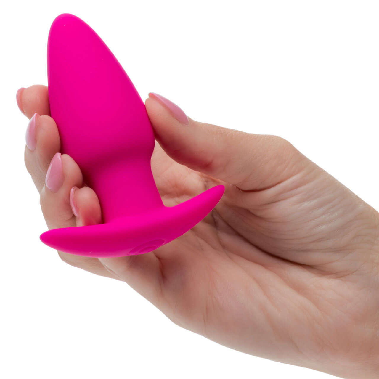 Basic Essentials Rechargeable Tapered Probe Pink held in hand showcasing its sleek design and compact size.