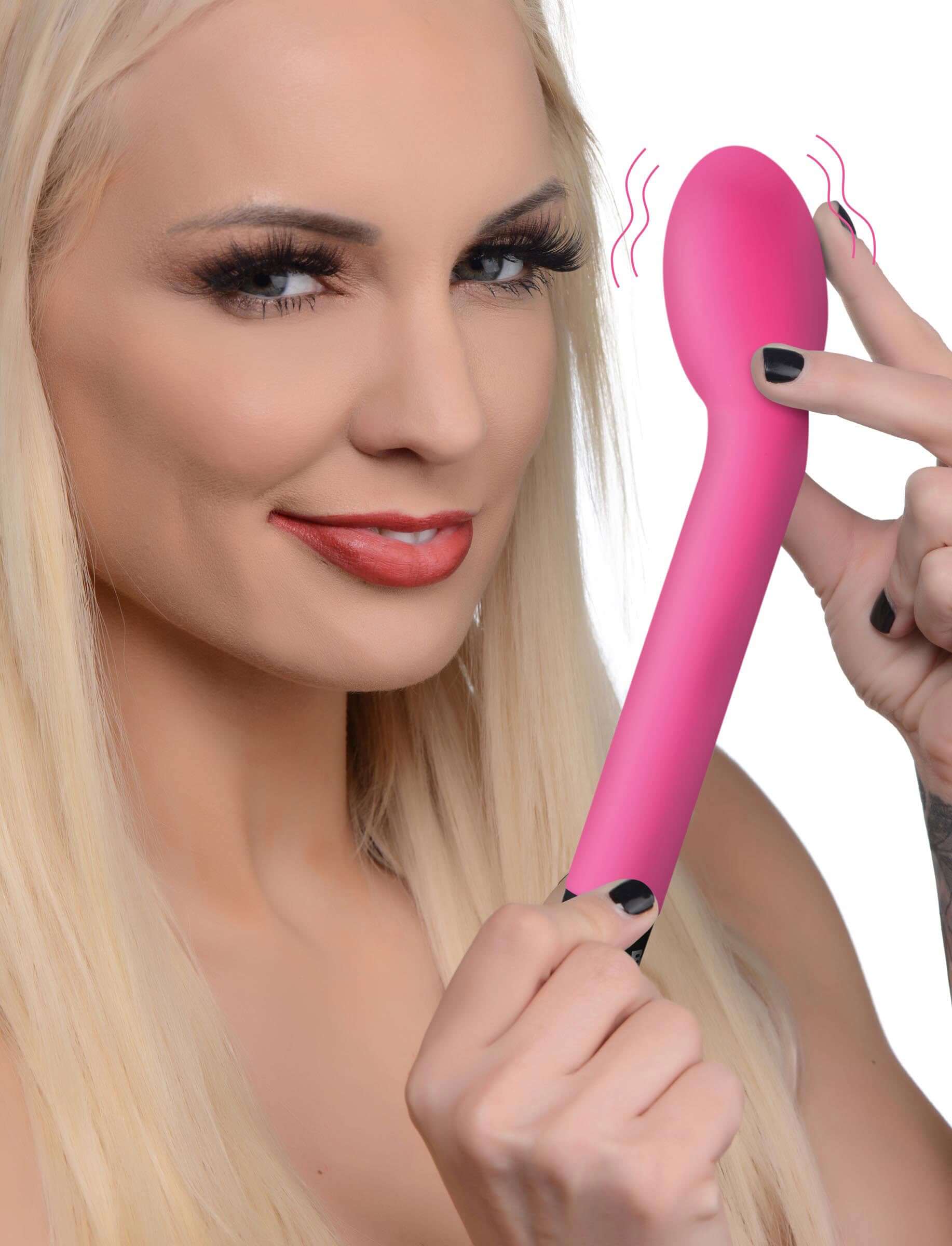 Model showcasing the Bang 10X Rechargeable Silicone G-Spot Vibrator Pink with a playful expression.