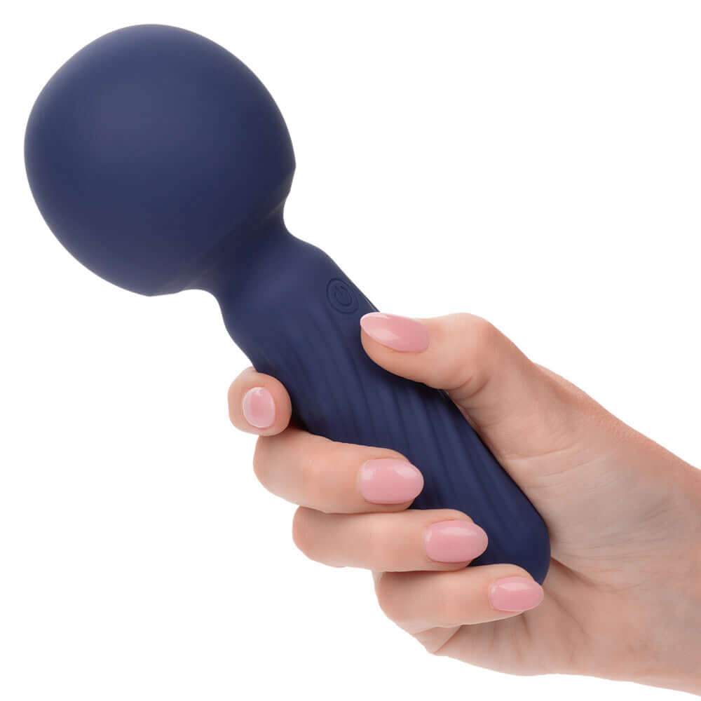 Blue Charisma Seduction Compact Wand Massager held in hand, showcasing body-safe silicone and ergonomic design for ultimate pleasure.