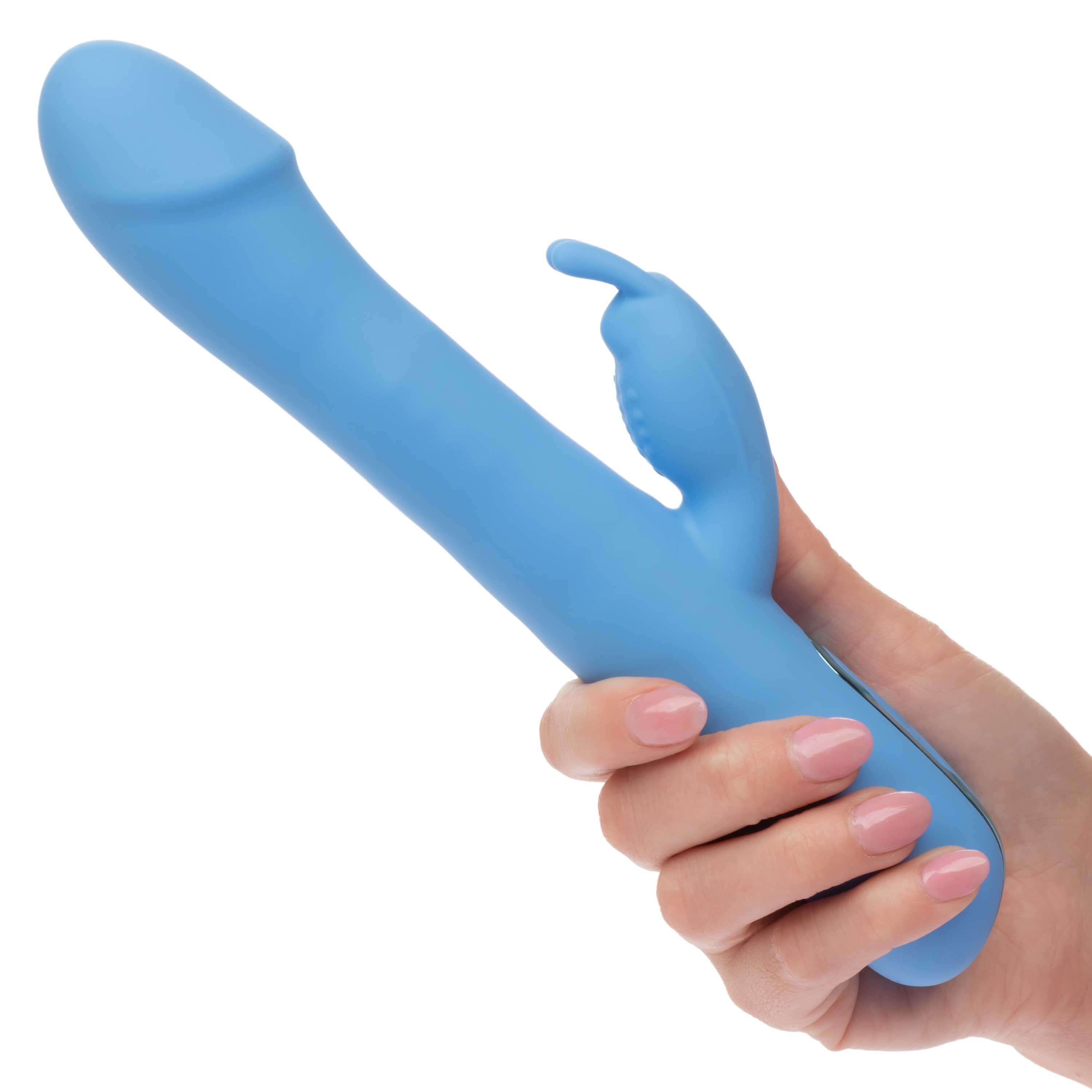 Jack Rabbit Elite Rotating Rabbit Vibrator Blue held in hand, showcasing its sleek design and dual-action features.