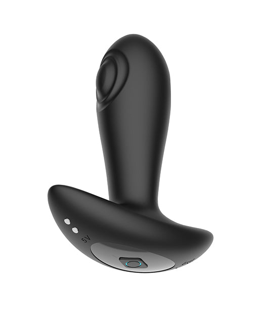 Secwell Reggie Tapping Anal Plug Black showcasing its sleek design and control features for enhanced pleasure.